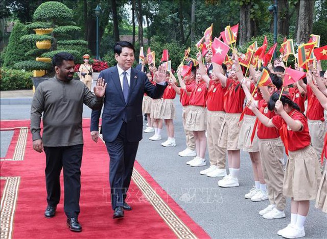 国家主席梁强举行仪式 欢迎斯里兰卡总统访越- Ảnh 3.