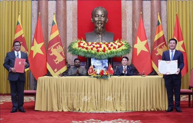 国家主席梁强同斯里兰卡总统库马拉·迪萨纳亚克举行会谈- Ảnh 3. 国家主席梁强同斯里兰卡总统库马拉·迪萨纳亚克举行会谈- Ảnh 3.