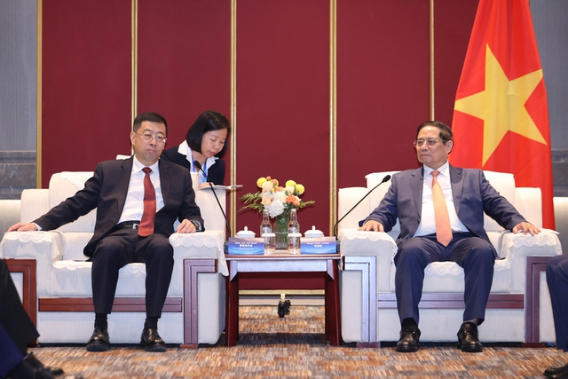 越南政府总理范明正会见中国驰名企业负责人- Ảnh 1.