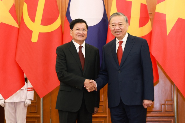 越共中央总书记苏林同老挝总书记通伦·西苏里举行会谈- Ảnh 1. 越共中央总书记苏林同老挝总书记通伦·西苏里举行会谈- Ảnh 1.