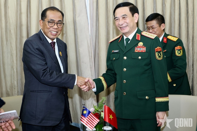潘文江大将与马来西亚、新加坡及韩国国防部长举行双边会晤 - Ảnh 1.