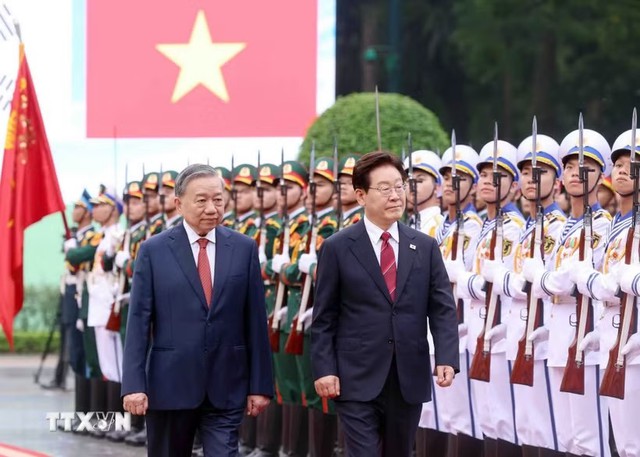 越共中央总书记，国家主席苏林举行仪式欢迎韩国总统李在明访越- Ảnh 1.