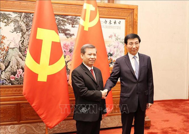 越南内政部长黎明智会见中国全国政协主席王沪宁- Ảnh 1.