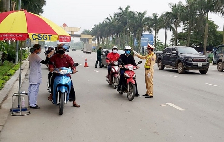 Xây dựng văn hóa giao thông an toàn gắn với kiểm soát hiệu quả dịch COVID-19 - Ảnh 1.