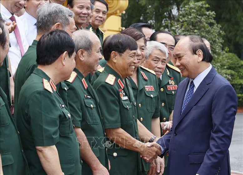 Chủ tịch nước tiếp đại biểu cựu chiến binh Mặt trận Vị Xuyên - Hà Tuyên - Ảnh 1.