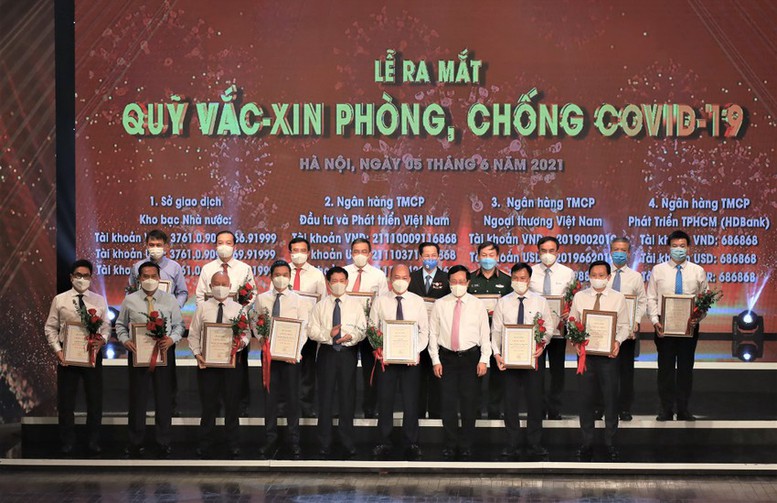 Tháo gỡ vướng mắc xếp loại doanh nghiệp nhà nước tham gia đóng góp, ủng hộ phòng, chống dịch COVID-19 - Ảnh 1.