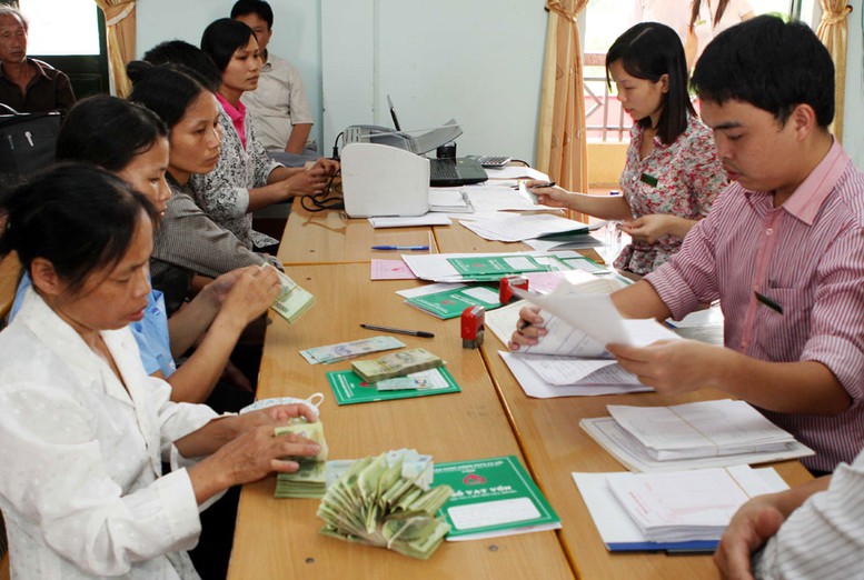 NHNN triển khai phong trào thi đua “Vì người nghèo-Không để ai bị bỏ lại phía sau” - Ảnh 1.