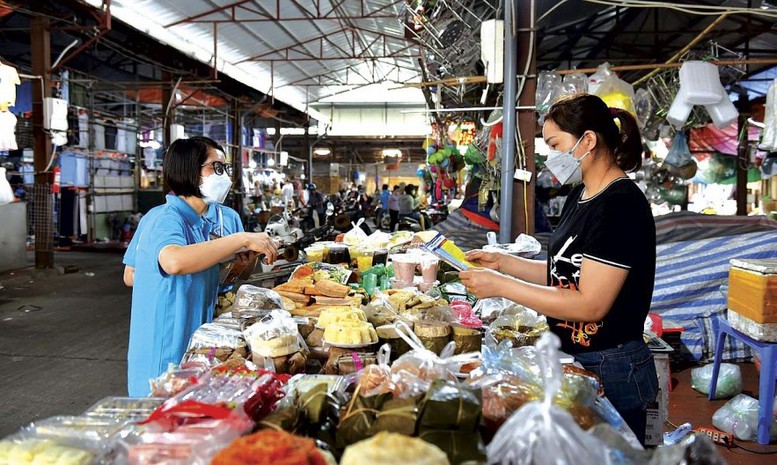 Đề xuất phương án bảo đảm quyền lợi cho chủ hộ kinh doanh tham gia BHXH - Ảnh 1.