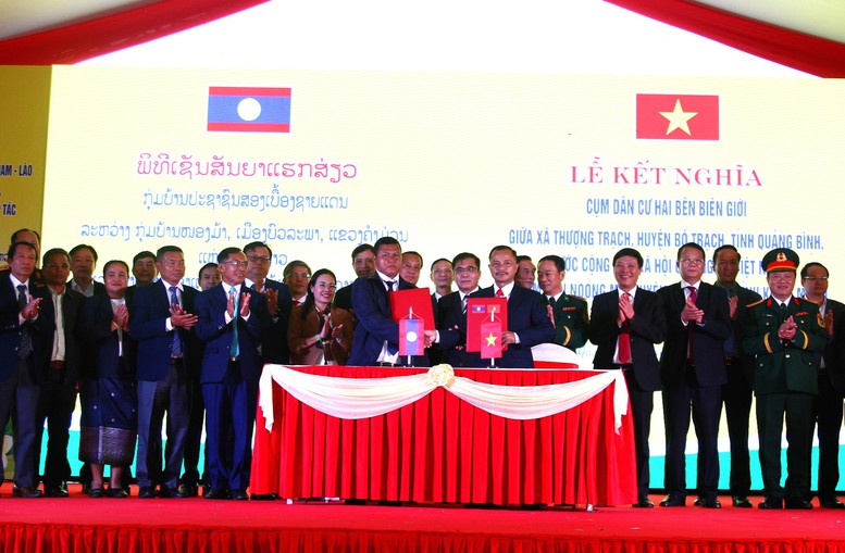 Kết nghĩa cụm dân cư hai bên biên giới Việt Nam - Lào- Ảnh 1.