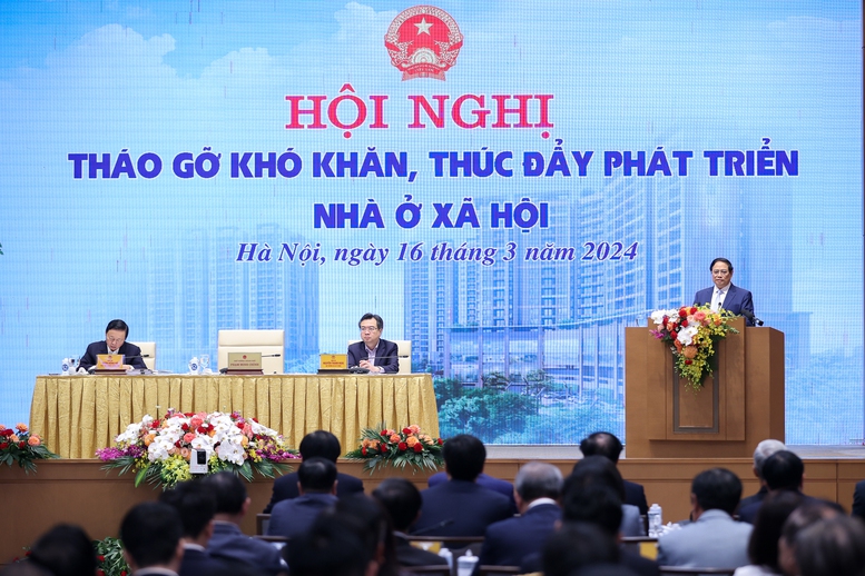 Thủ tướng Phạm Minh Chính chủ trì hội nghị tháo gỡ khó khăn, thúc đẩy phát triển nhà ở xã hội- Ảnh 1.