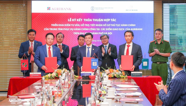 Agribank tiên phong mô hình “3 bên – 1 điểm chạm”, đưa dịch vụ công đến gần người dân- Ảnh 1.