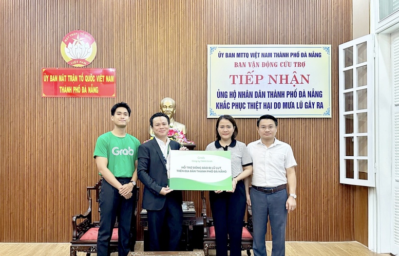 Grab Việt Nam hỗ trợ tài xế tại Huế, Đà Nẵng chi phí sửa xe ngập nước - Ảnh 2. Grab Việt Nam hỗ trợ tài xế tại Huế, Đà Nẵng chi phí sửa xe ngập nước - Ảnh 2.