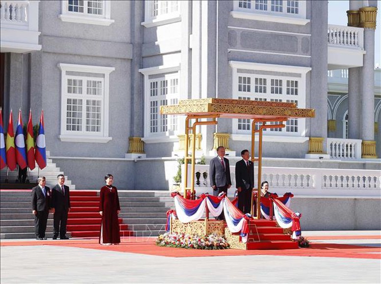 Lễ đón trọng thể Tổng Bí thư Tô Lâm và Phu nhân tại thủ đô Viêng Chăn (Lào)- Ảnh 1.
