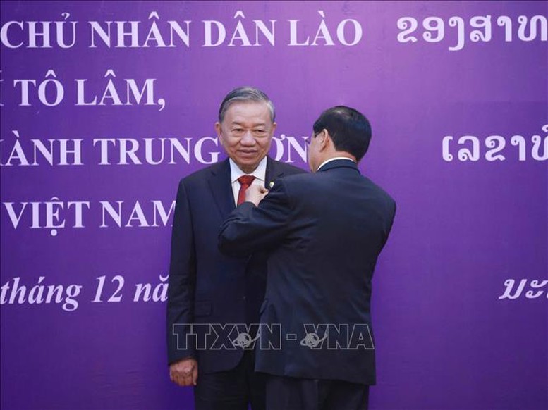 Tổng Bí thư Tô Lâm nhận Huân chương Vàng Quốc gia của Nhà nước Lào- Ảnh 3. Tổng Bí thư Tô Lâm nhận Huân chương Vàng Quốc gia của Nhà nước Lào- Ảnh 3.