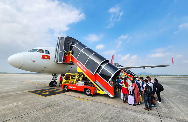 Xu hướng mua vé Tết sớm, lựa chọn bay tiết kiệm lên ngôi- Ảnh 1.