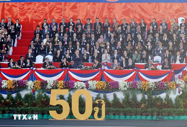 Tổng Bí thư Tô Lâm và Phu nhân dự Lễ kỷ niệm 50 năm Quốc khánh Lào- Ảnh 4. Tổng Bí thư Tô Lâm và Phu nhân dự Lễ kỷ niệm 50 năm Quốc khánh Lào- Ảnh 4.