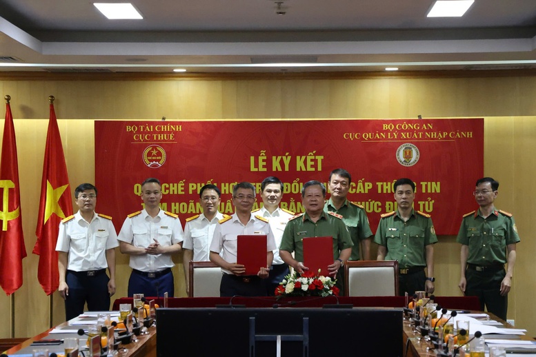 Bước tiến mới trong kiểm soát nợ thuế và xuất nhập cảnh- Ảnh 1.
