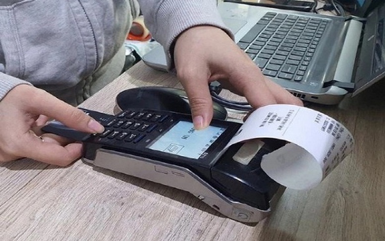Ngành thuế tăng tốc triển khai đưa hóa đơn điện tử từ máy tính tiền đến từng hộ kinh doanh- Ảnh 1.