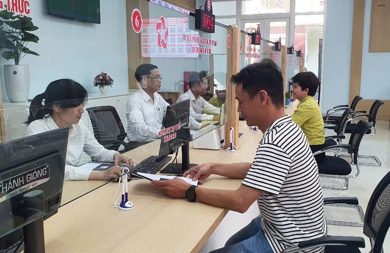 Phát huy hiệu quả chính quyền cấp xã mới, lấy nhân dân làm trung tâm phục vụ- Ảnh 2.