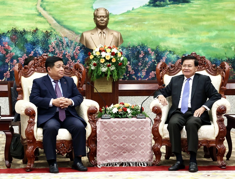 Việt Nam, Lào tiếp tục tăng cường tin cậy chính trị, hợp tác kinh tế, cùng vun đắp mối quan hệ đoàn kết đặc biệt- Ảnh 1.