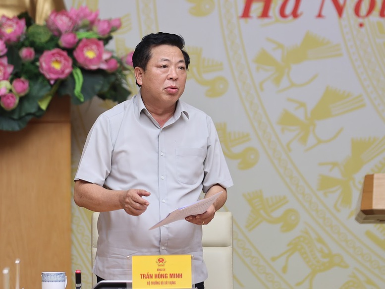 Bộ trưởng xây dựng Trần Hồng Minh phát biểu tại phiên họp - Ảnh: VGP/Nhật Bắc
