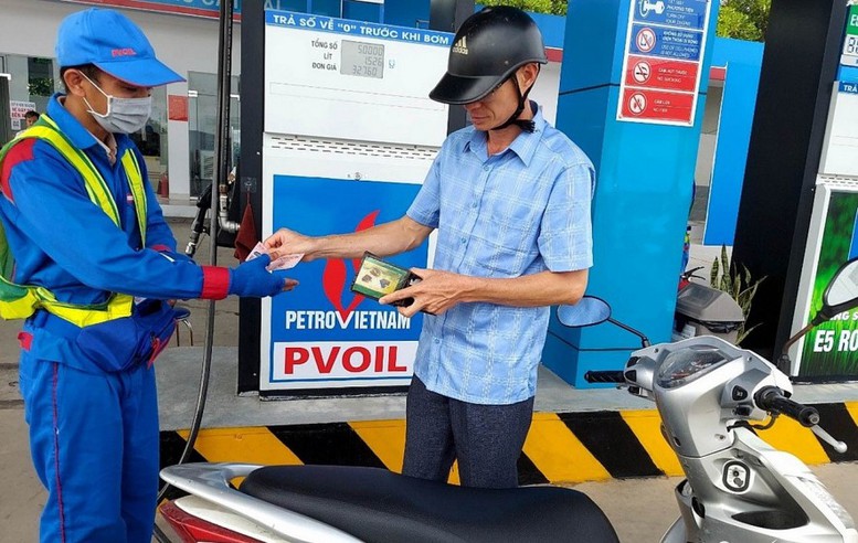 Giá xăng tăng nhẹ- Ảnh 1.