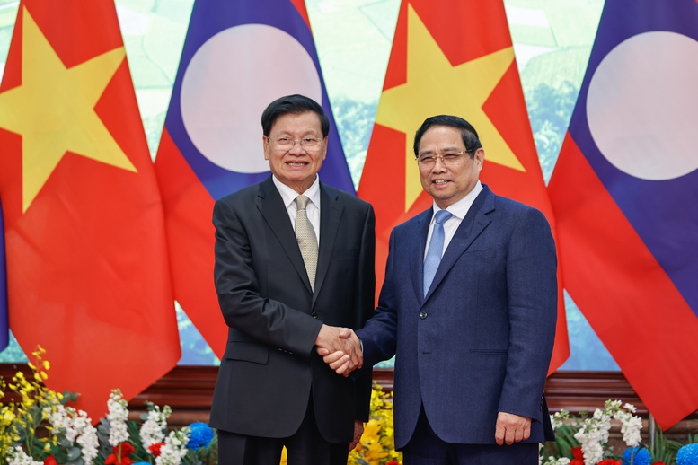Thủ tướng Phạm Minh Chính hội kiến Tổng Bí thư, Chủ tịch nước Lào- Ảnh 1.