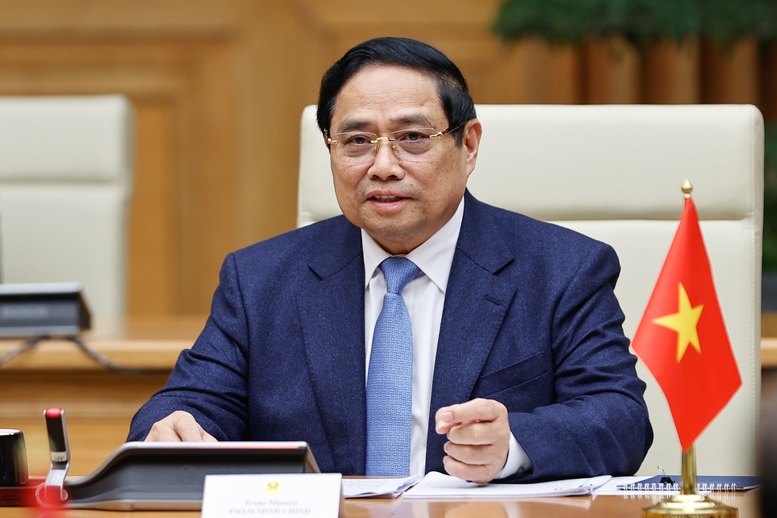 Thủ tướng Phạm Minh Chính hội kiến Tổng Bí thư, Chủ tịch nước Lào- Ảnh 2.