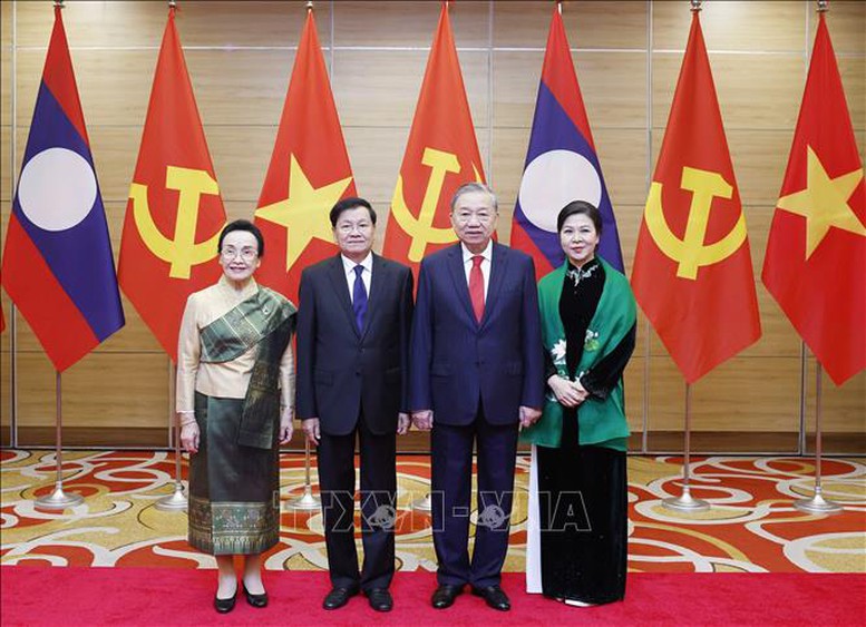 Chiêu đãi trọng thể chào mừng Tổng Bí thư, Chủ tịch nước Lào Thongloun Sisoulith và Phu nhân cùng Đoàn đại biểu cấp cao Lào- Ảnh 1.