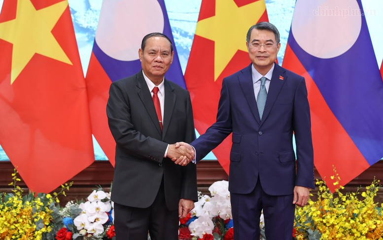 Lào quyết tâm cùng Việt Nam gìn giữ, vun đắp và phát huy mối quan hệ hữu nghị vĩ đại