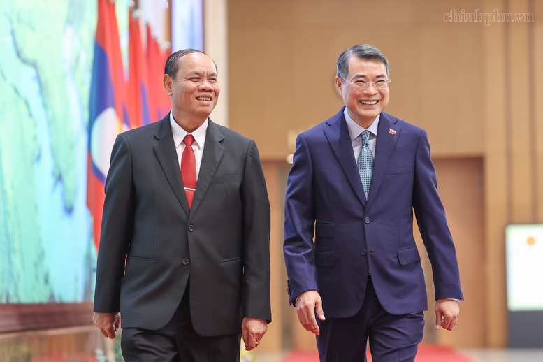 Lào quyết tâm cùng Việt Nam gìn giữ, vun đắp và phát huy mối quan hệ hữu nghị vĩ đại- Ảnh 1.