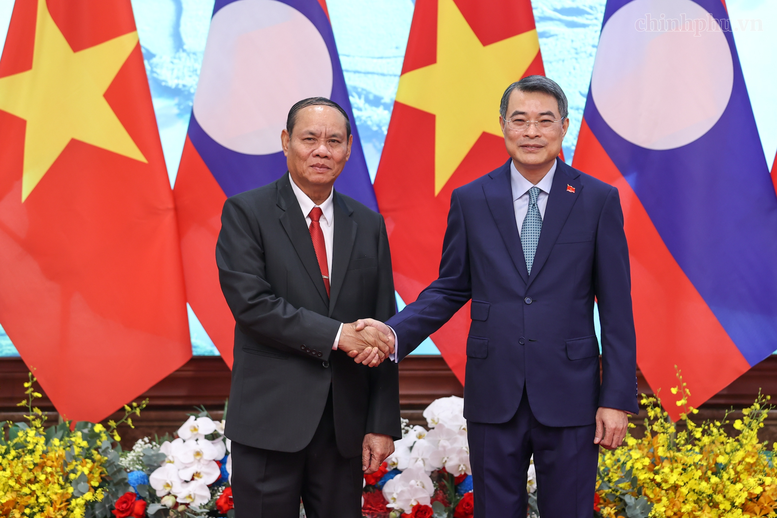Lào quyết tâm cùng Việt Nam gìn giữ, vun đắp và phát huy mối quan hệ hữu nghị vĩ đại- Ảnh 2.