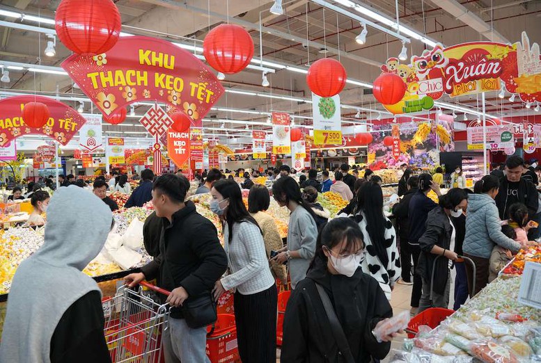 Thị trường ngày 29 Tết: Nguồn cung dồi dào, giá cả ổn định- Ảnh 1.