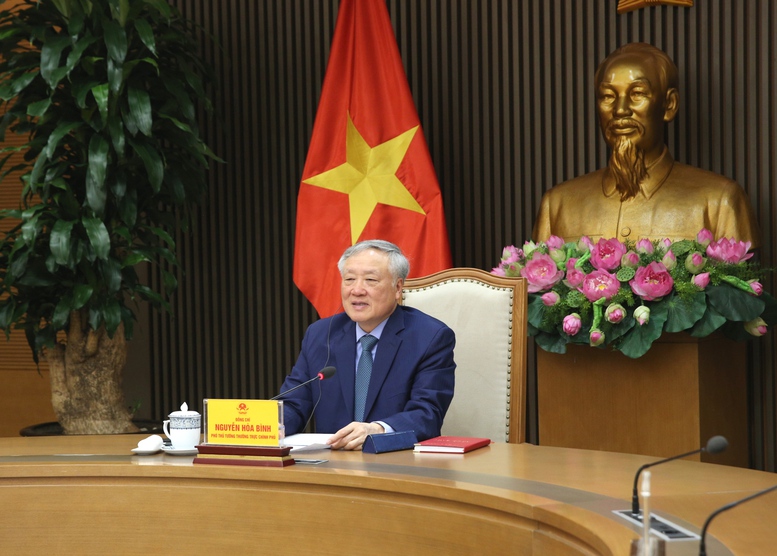 Phó Thủ tướng Thường trực Nguyễn Hòa Bình điện đàm với nguyên Phó Thủ tướng Singapore Vương Thụy Kiệt- Ảnh 1.