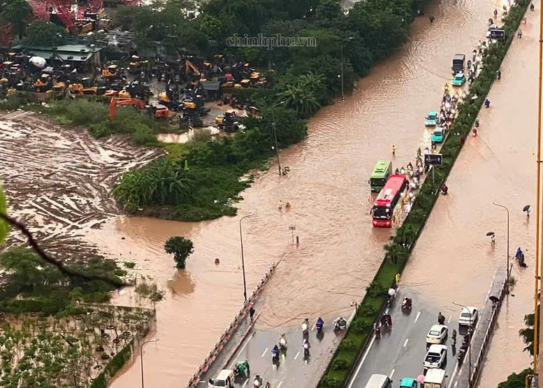 Mưa lũ gây ngập sâu, nhiều sông vượt báo động 3- Ảnh 1.