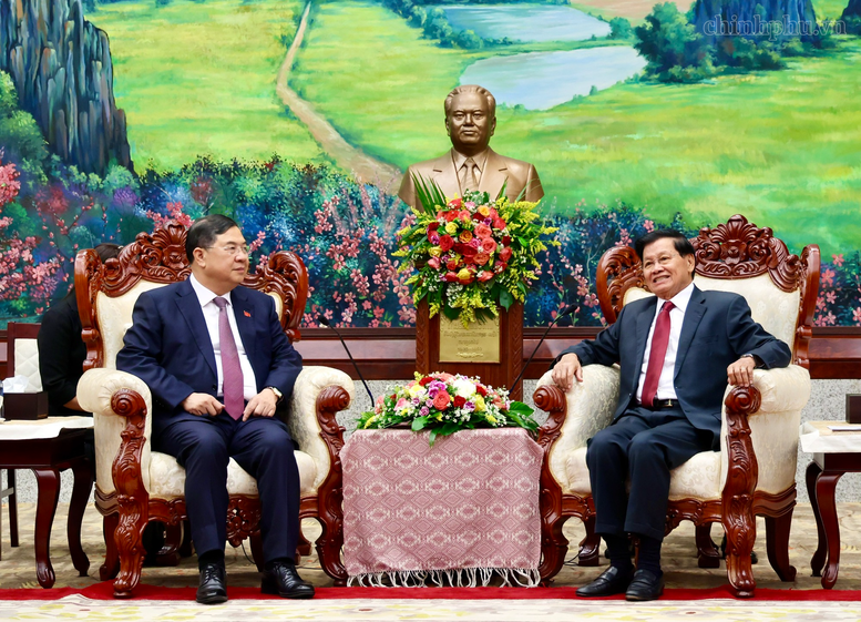 Phó Thủ tướng Thường trực Phạm Gia Túc chào Tổng Bí thư, Chủ tịch nước và Thủ tướng Lào- Ảnh 2.