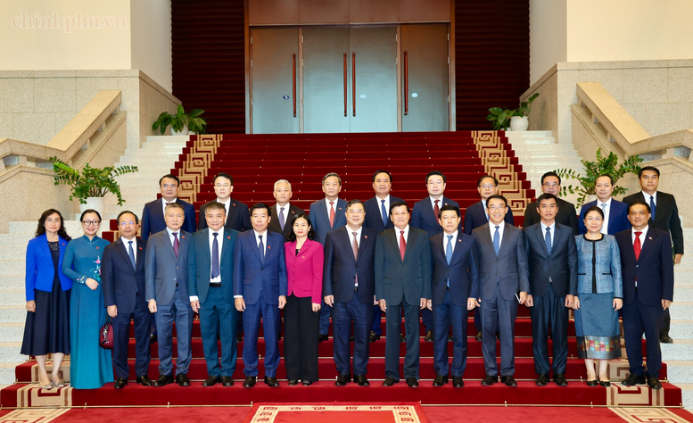 Phó Thủ tướng Thường trực Phạm Gia Túc chào Tổng Bí thư, Chủ tịch nước và Thủ tướng Lào- Ảnh 4.