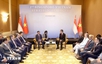 Singapore hosts official welcome ceremony for Politburo member Tran Cam Tu