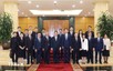 越共中央宣教和民运部部长阮仲义会见中国人民日报社总编辑陈建文