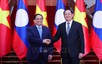 越南政府总理范明政会见老挝总理宋赛·西潘敦