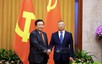 越中两党加强治党治国经验交流