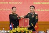 Viet Nam, Laos sign MoU on cooperation in military and defense law