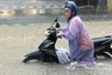 Heavy downpours leave Ha Noi's low-lying streets under water