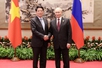 President Luong Cuong meets Russian President Putin in Beijing