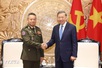 Top leader hosts Cambodian, Lao defense ministers