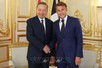 Top leader holds talks with French President Macron in Paris
