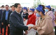 越南政府总理范明正春节前开展走访慰问活动