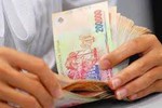 Quy định nâng lương trước hạn sau khi sáp nhập đơn vị hành chính