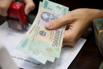 Xác định quỹ tiền lương thực hiện tại doanh nghiệp nhà nước