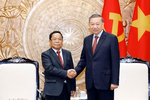 Top leader reaffirms Viet Nam's unwavering support for Laos' development